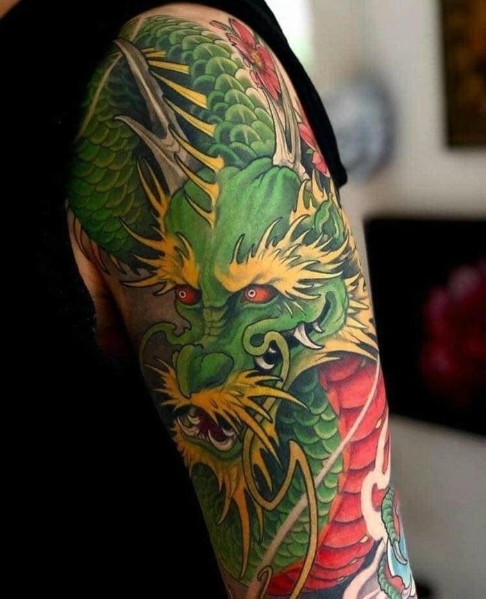 Hình xăm cá chép hóa rồng ở bắp tay
