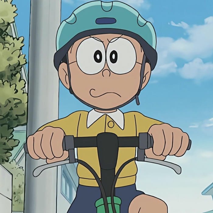 ảnh nobita đang đi xe đạp
