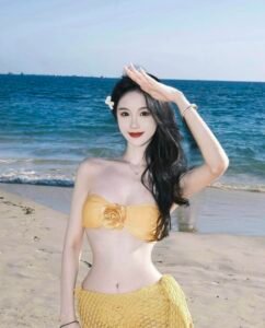 Hình gái xinh Trung Quốc mặc bikini như một trang tạp chí du lịch