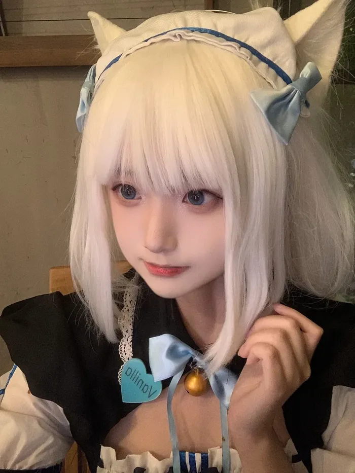 Hình cosplay mèo đáng yêu tinh nghịch